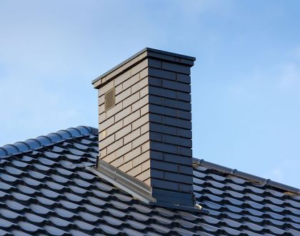 Elewacje kominów - czym i jak wykończyć ściany komina domu?